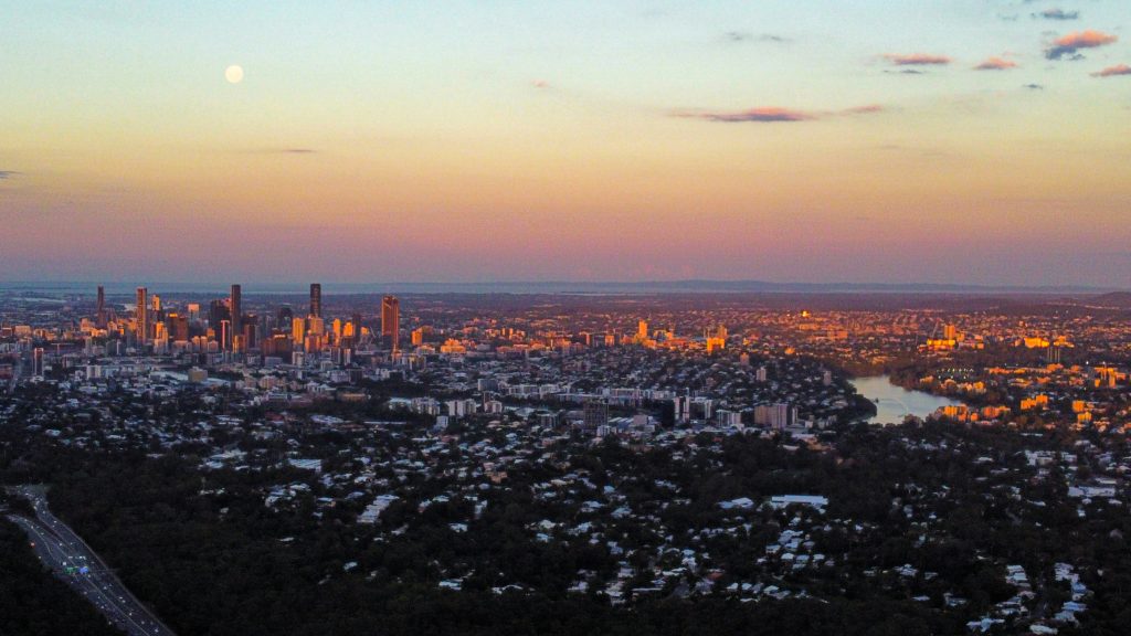 Aerial sunset view of the Brisbane skyline and Brisbane River, Queensland.